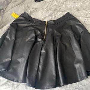 Black pleather skater skirt, never worn, tag still attached size: 3x